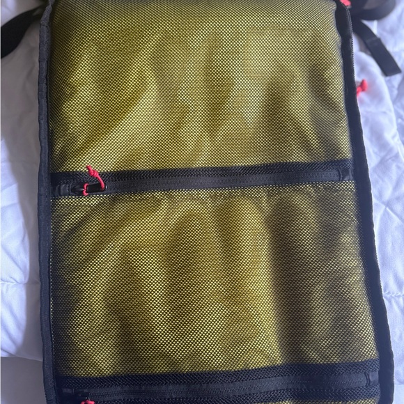 Topo Designs Backpack in Black, Red, and Yellow - Picture 4 of 10